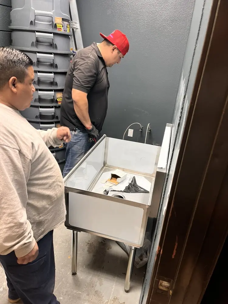 Commercial plumbing and sink installation in Slaton